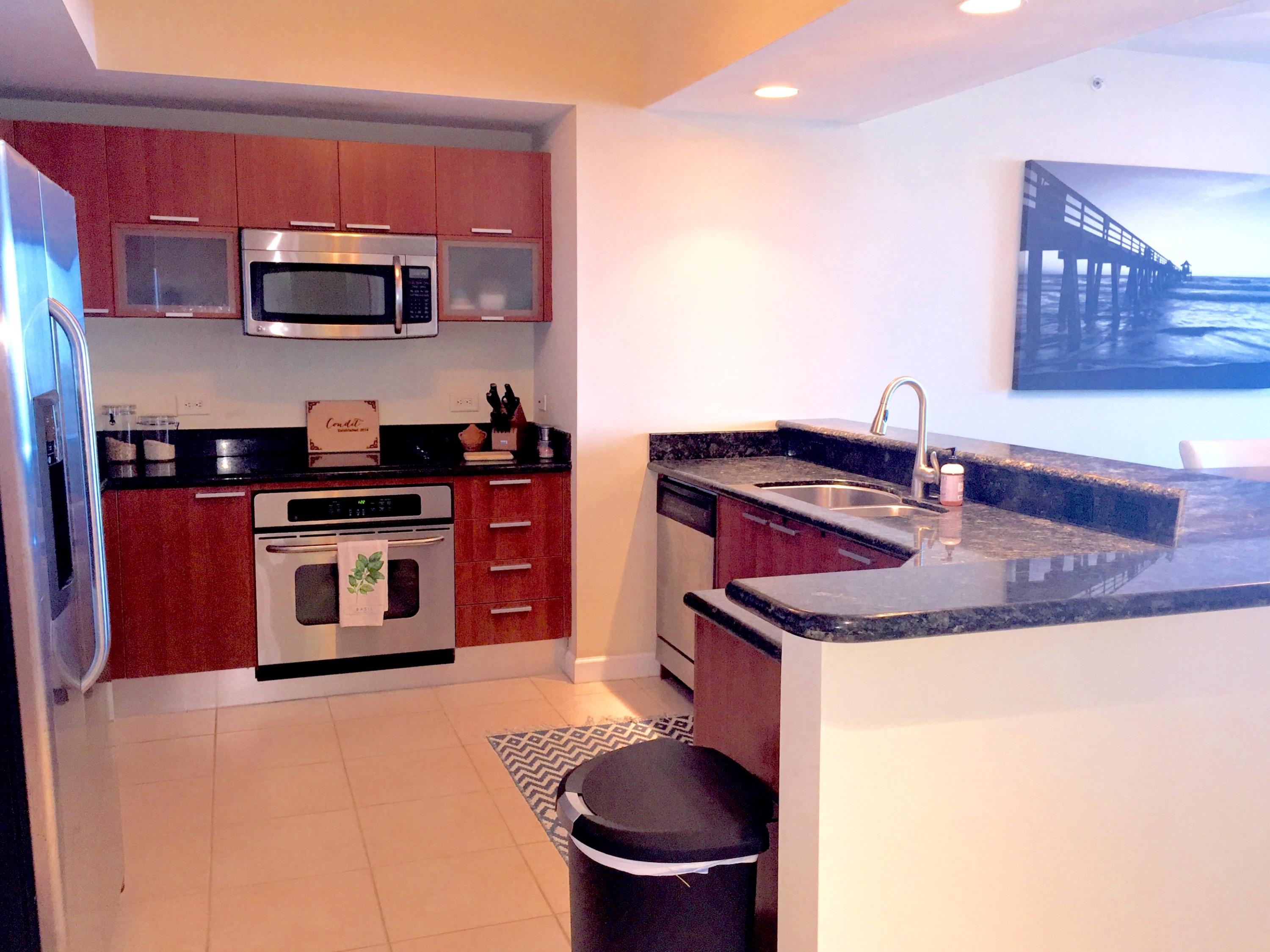 2640 Lake Shore Drive, Unit 511 Riviera Beach, FL 33404 - Photo 11 of 52 OPEN EURO KITCHEN