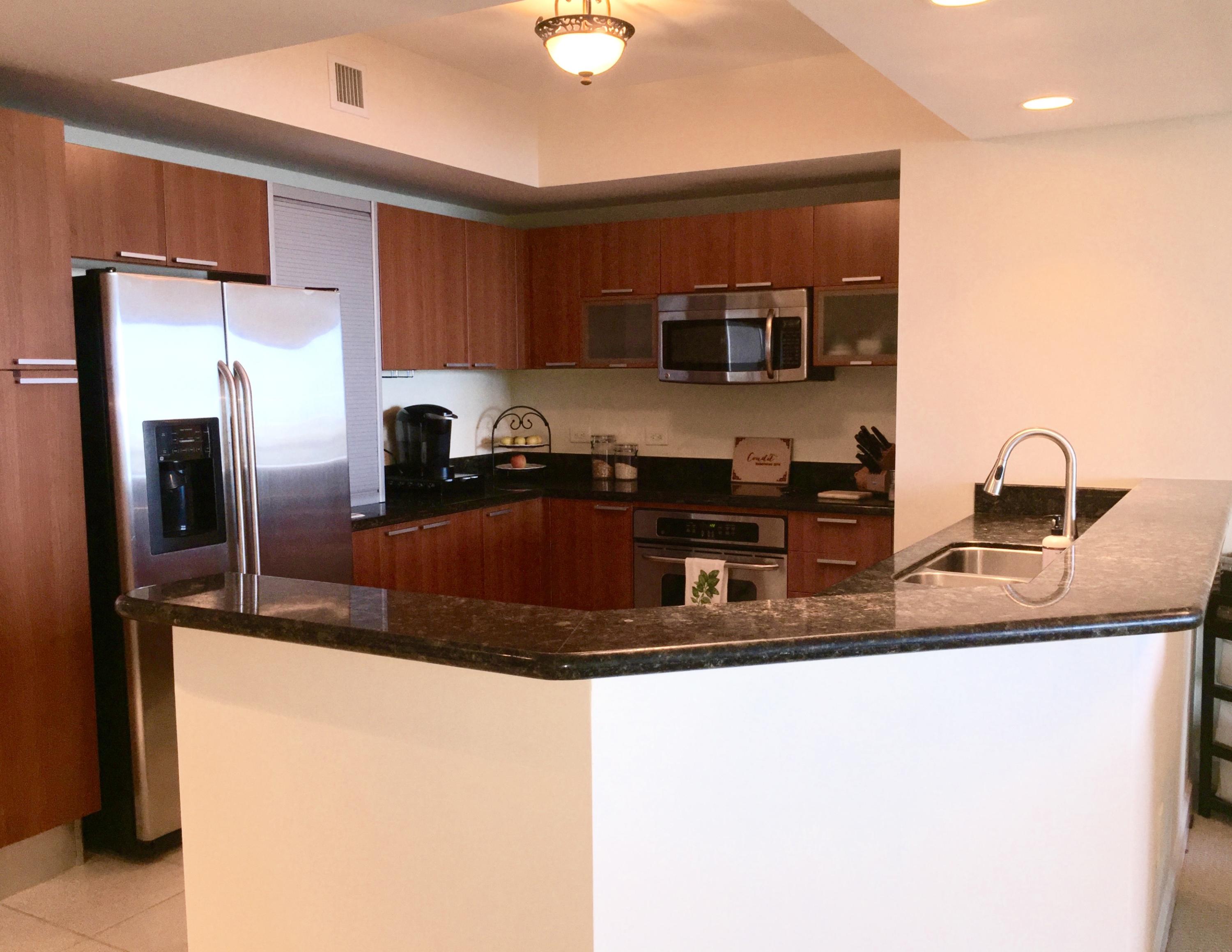 2640 Lake Shore Drive, Unit 511 Riviera Beach, FL 33404 - Photo 10 of 52 BLACK GRANITE COUNTERTOPS