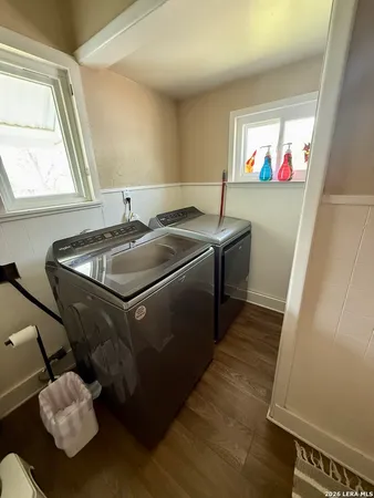 a utility room with washer and dryer