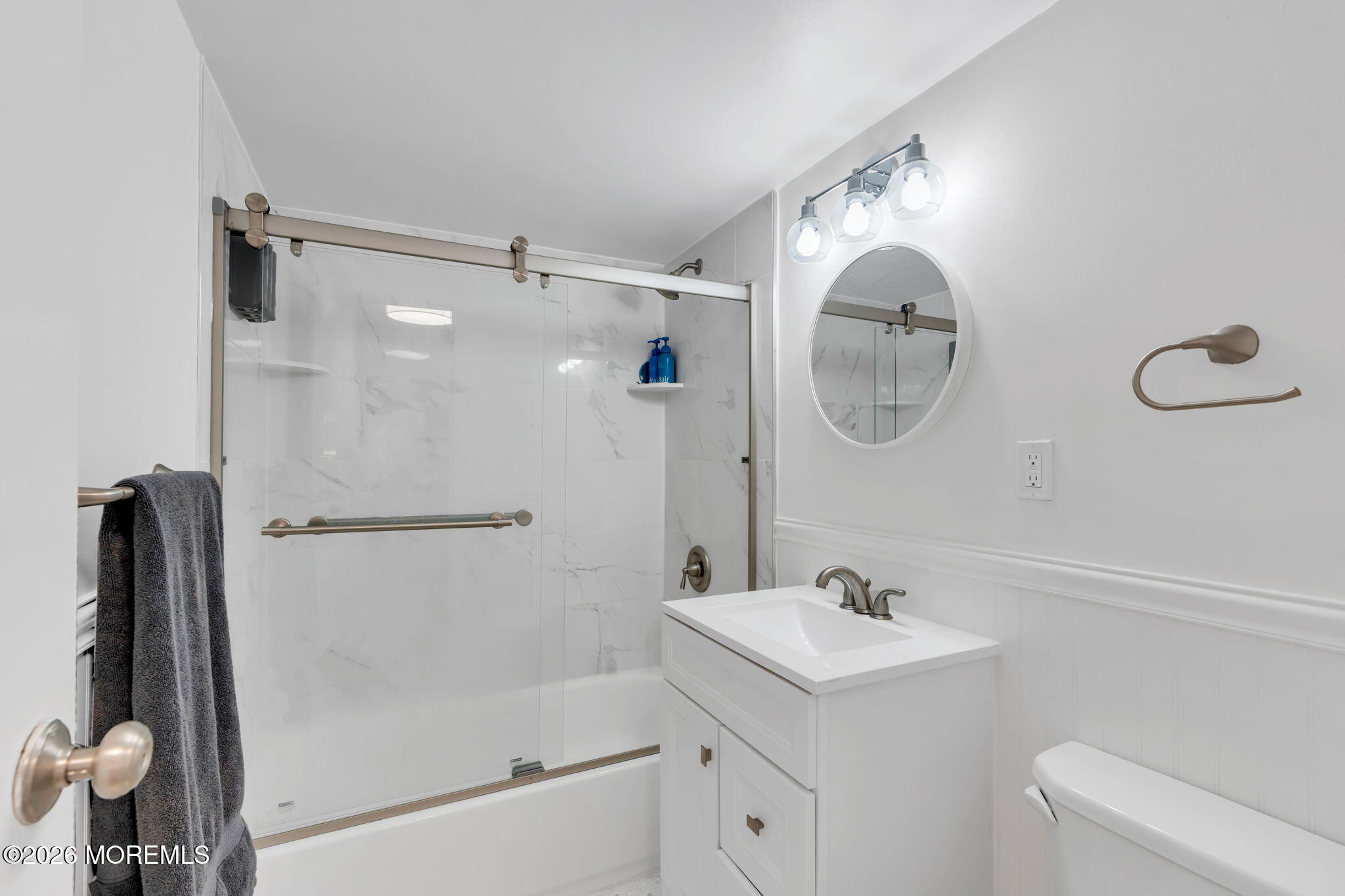 1000 River Road, Unit 7G Belmar, NJ 07719 - Photo 12 of 25 a bathroom with a sink toilet and shower