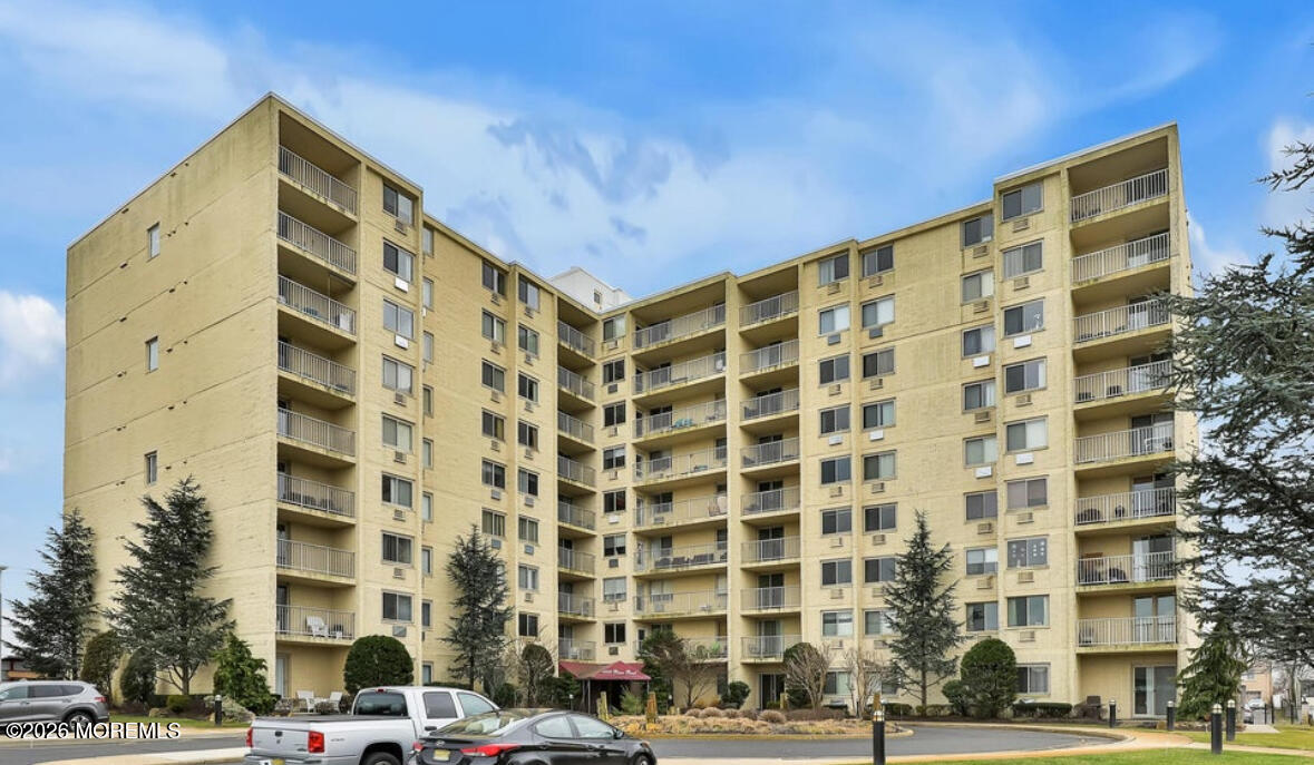 1000 River Road, Unit 7G Belmar, NJ 07719 - Photo 22 of 25 a front view of a building