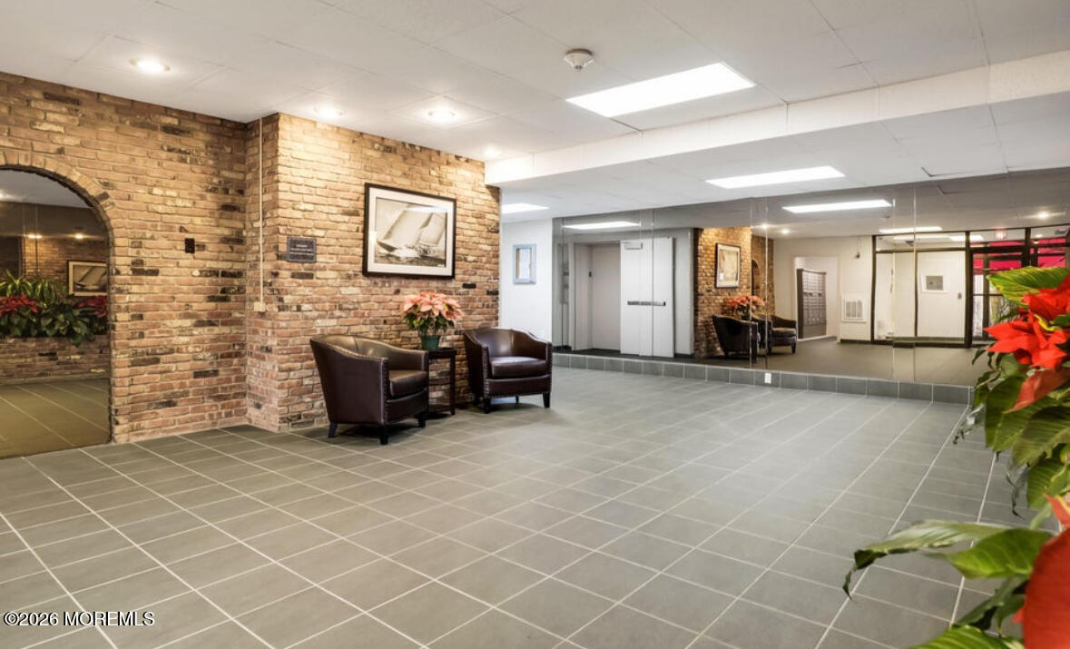 1000 River Road, Unit 7G Belmar, NJ 07719 - Photo 24 of 25 a living room with furniture