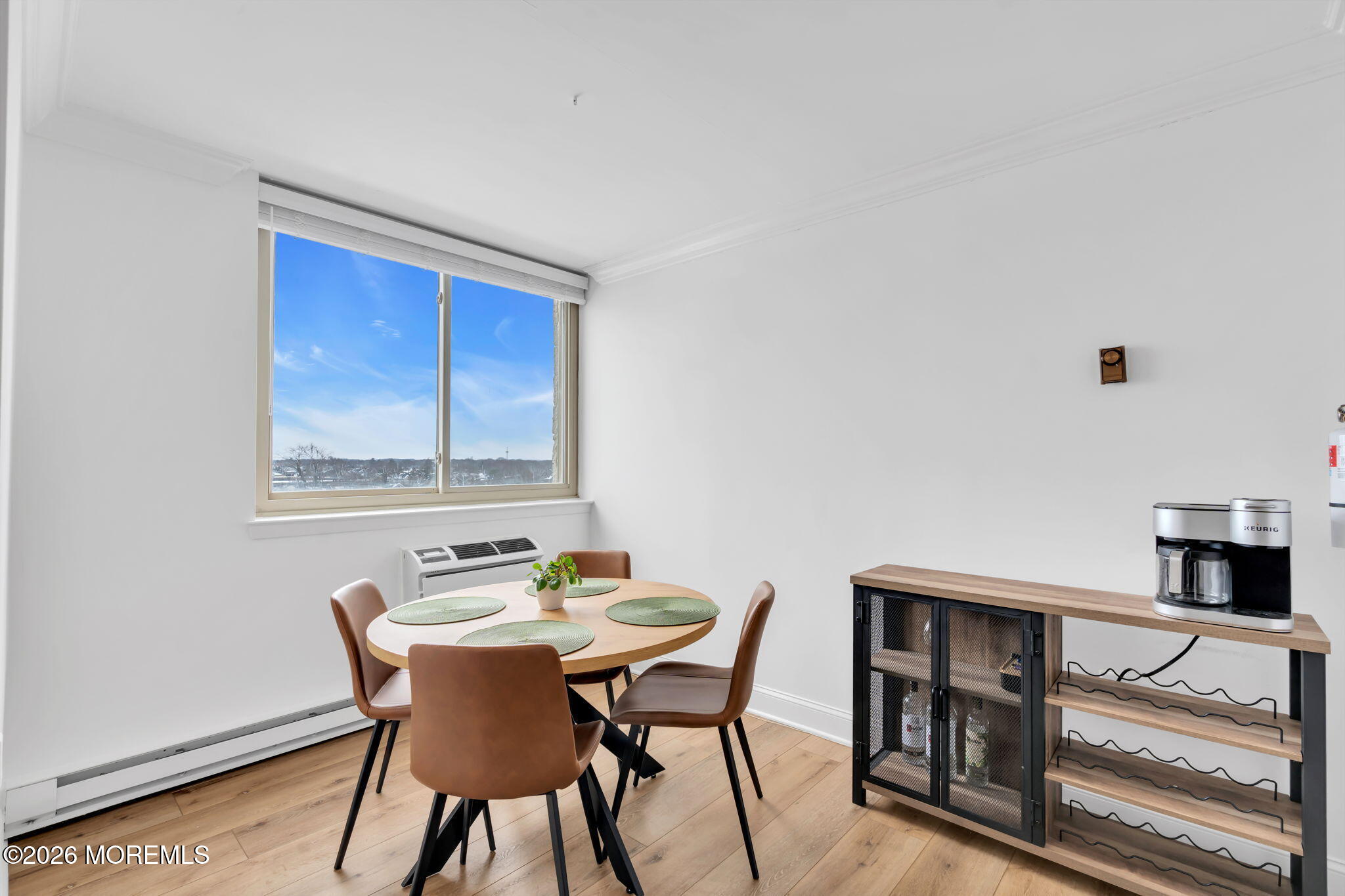 1000 River Road, Unit 7G Belmar, NJ 07719 - Photo 5 of 25 a view of a dining room with furniture