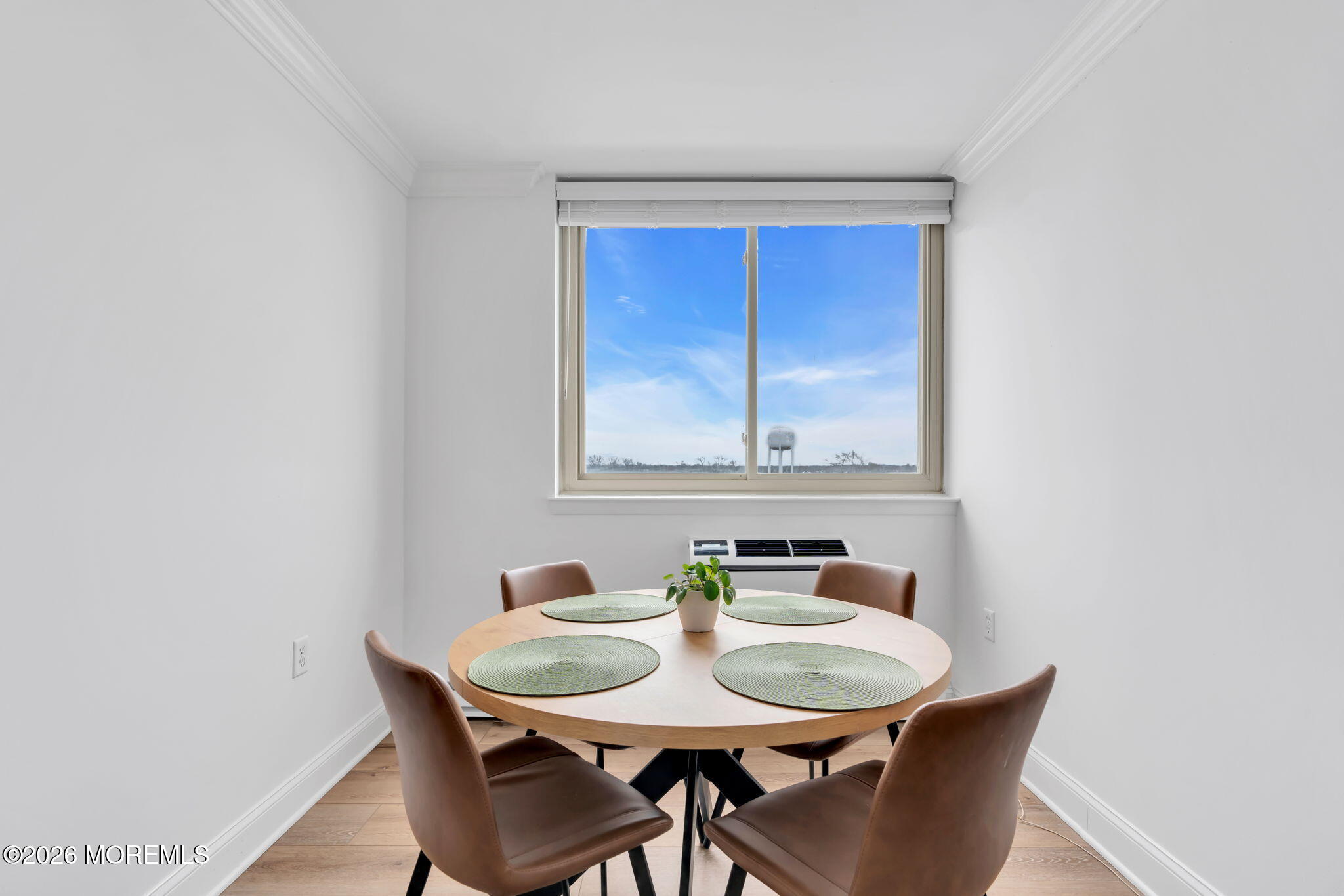 1000 River Road, Unit 7G Belmar, NJ 07719 - Photo 6 of 25 a view of a dining room with furniture and window