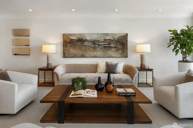 a living room with furniture and a lamp