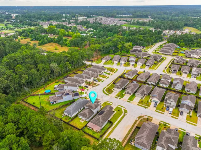 an aerial view of multiple house