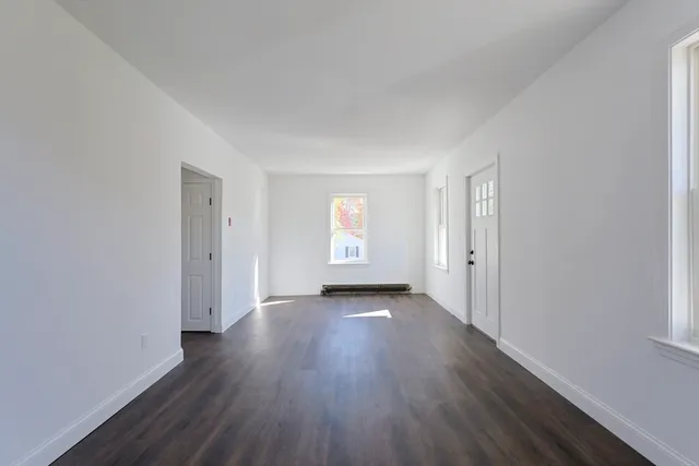 a view of livingroom with furniture and wooden floor