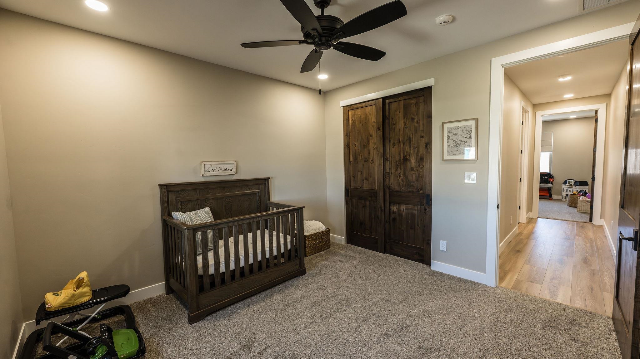 2639 Emerald Ridge Lane Grand Junction, CO 81506 - Photo 25 of 42 a view of a hallway to a livingroom with furniture