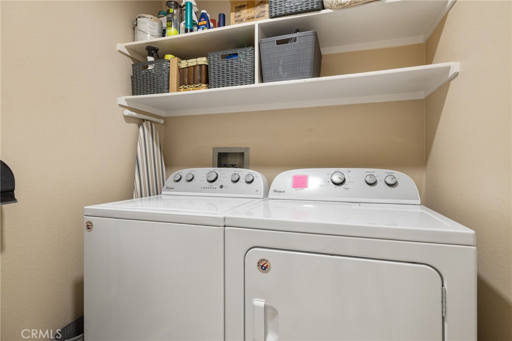 79822 Olympia Fields La Quinta, CA 92253 - Photo 32 of 48 a utility room with dryer and washer
