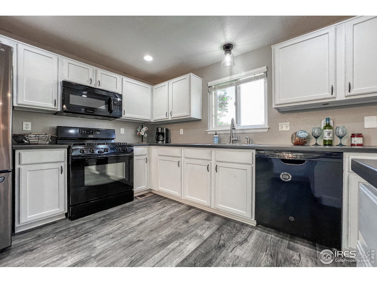 7982 Liley Avenue Frederick, CO 80530 - Photo 12 of 40 Large kitchen has ample cabinet space.