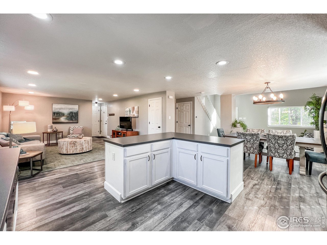 7982 Liley Avenue Frederick, CO 80530 - Photo 15 of 40 The kitchen seamlessly connects to the family room