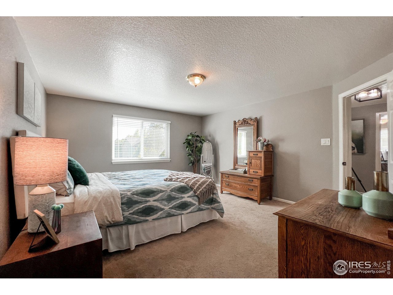 7982 Liley Avenue Frederick, CO 80530 - Photo 22 of 40 Wake up to sunshine streaming in through the windows and the sound of songbirds outside