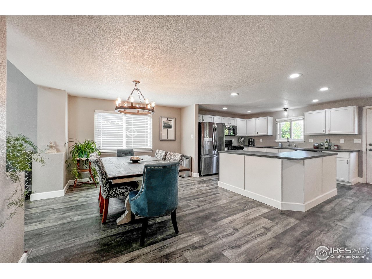 7982 Liley Avenue Frederick, CO 80530 - Photo 9 of 40 Beautiful floors in this bright and cheery home.