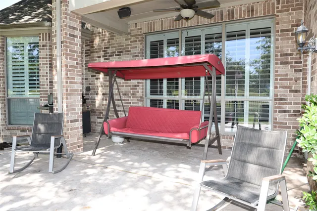 a view of balcony with a patio