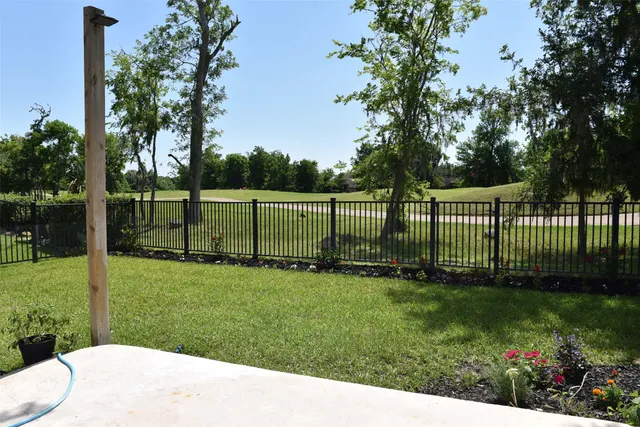 a view of a backyard with a garden