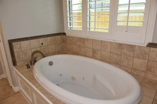 a bathroom with a bathtub