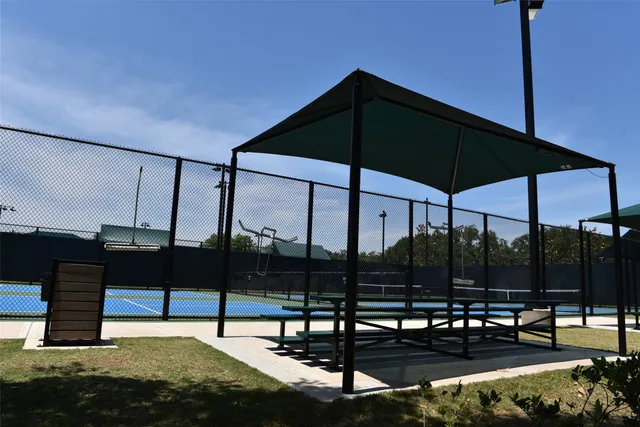 a view of a street with sitting area
