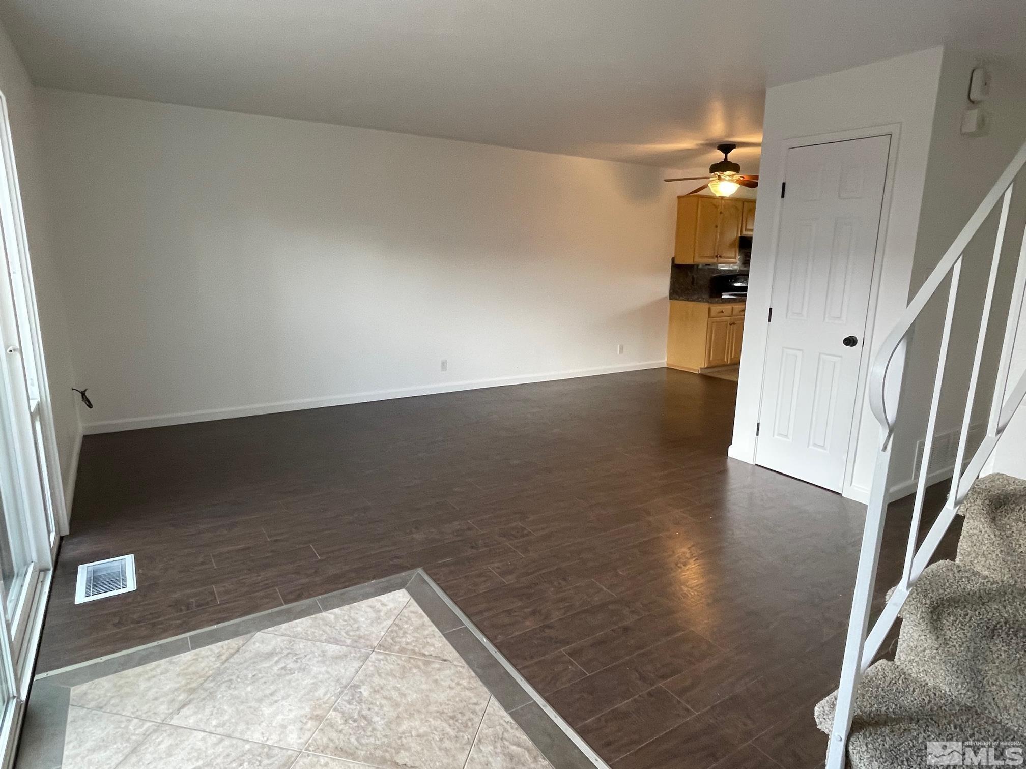 102 Smithridge Reno, NV 89502 - Photo 4 of 20 en empty room with wooden floor
