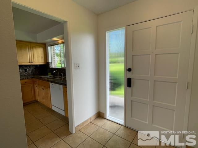 102 Smithridge Reno, NV 89502 - Photo 10 of 20 a view of a kitchen with white cabinets