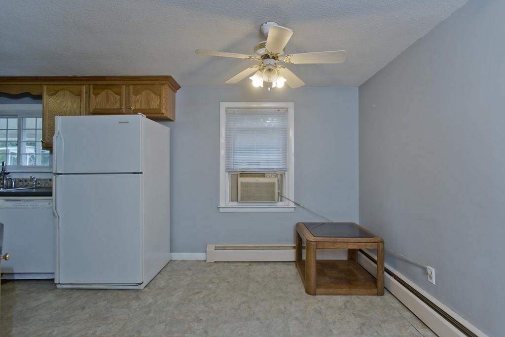 34 Glenn Street Three Rivers, MA 01080 - Photo 4 of 40 a view of a room with a table and chairs