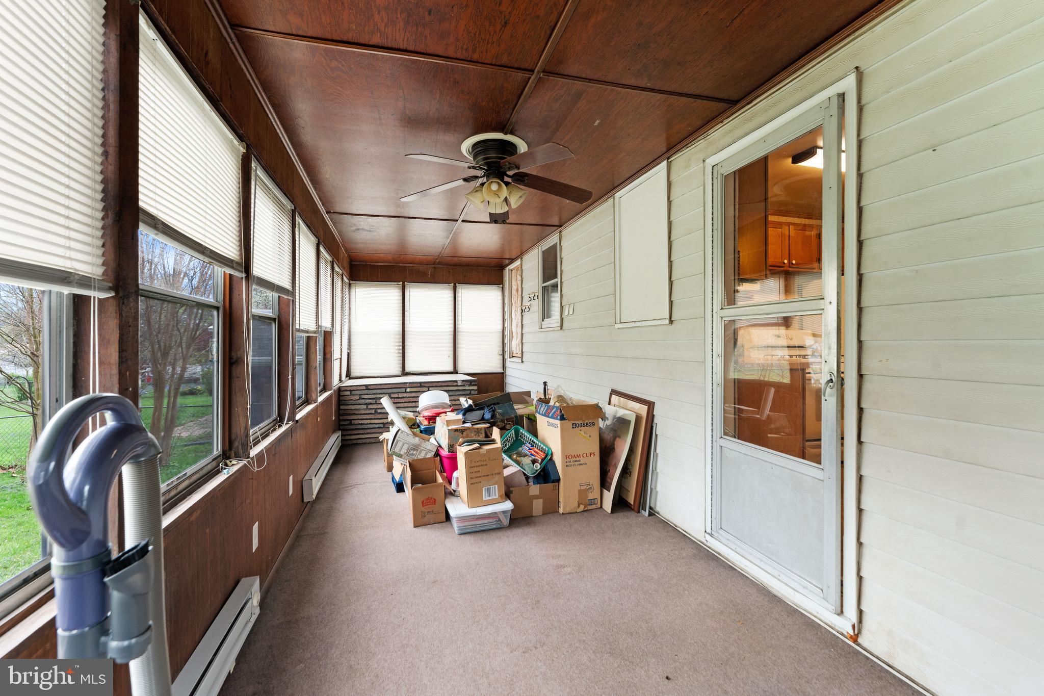 24 Mansion Road Linthicum Heights, MD 21090 - Photo 21 of 35 a view of a hallway with a bike and car