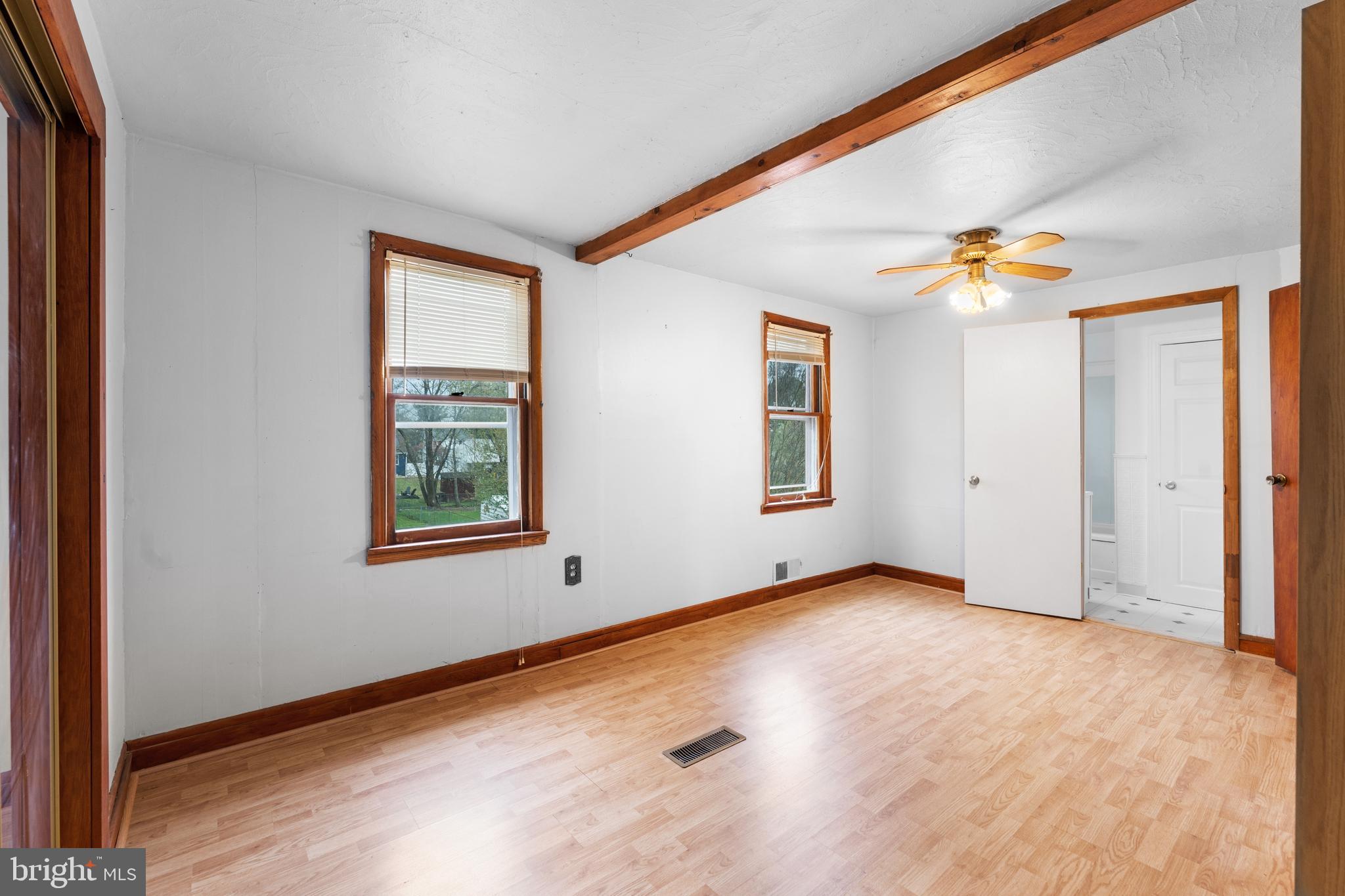 24 Mansion Road Linthicum Heights, MD 21090 - Photo 25 of 35 an empty room with fan and windows
