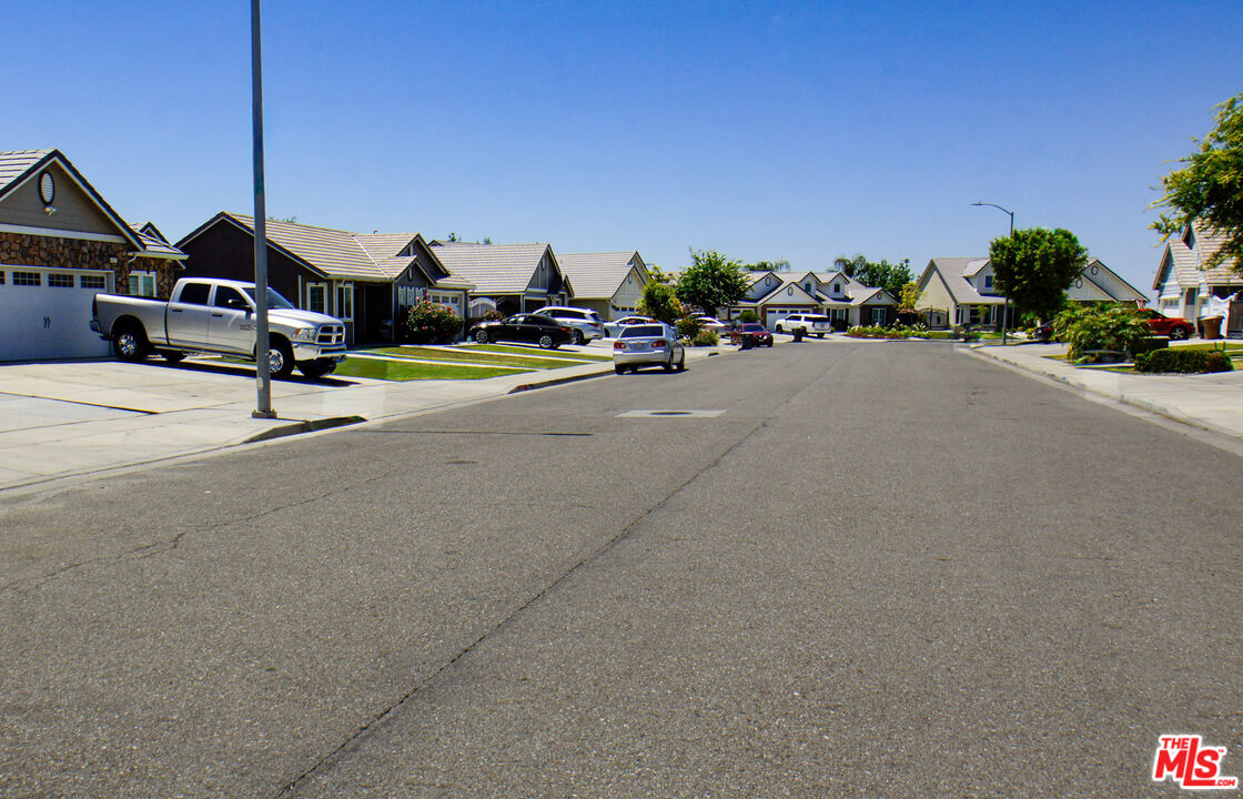 6014 Samuelson Street Bakersfield, CA 93313 - Photo 24 of 25 a car parked on the side of the road