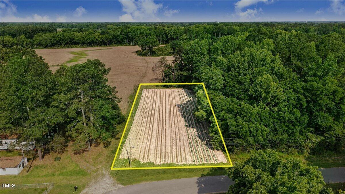 0 Dead End Road Enfield, NC 27823 - Photo 2 of 4 a view of backyard with swimming pool and outdoor seating