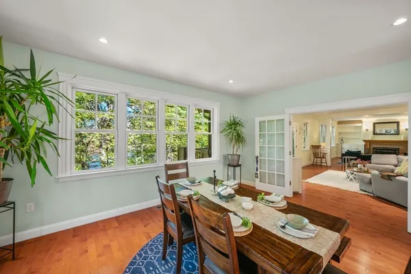 a view of a dining room with furniture window and outside view