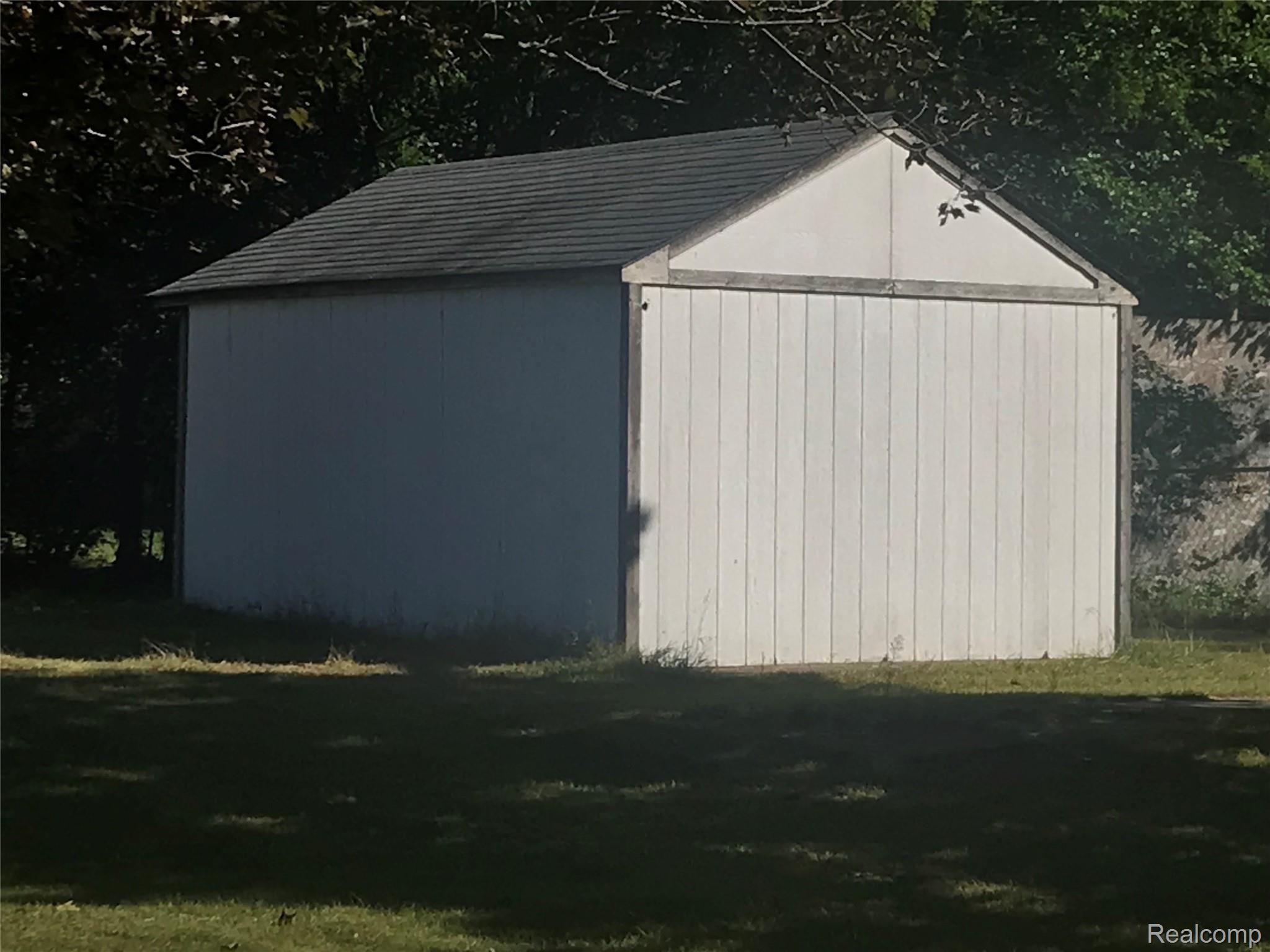 7015 Hatchery Road Waterford, MI 48327 - Photo 17 of 21 Back of shed