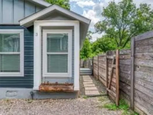 a front view of a house with a porch