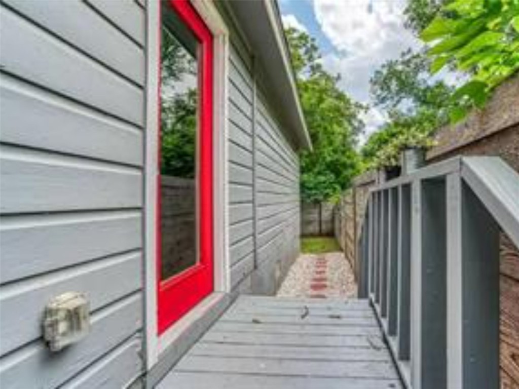 1139 1/2 Poquito Street, Unit 3 Austin, TX 78702 - Photo 21 of 23 a pathway of a house with a trees