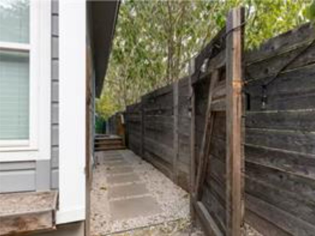 1139 1/2 Poquito Street, Unit 3 Austin, TX 78702 - Photo 23 of 23 a view of a pathway of a house