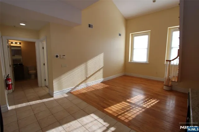 a view of an empty room and window