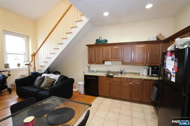 a kitchen with granite countertop lots of counter top space