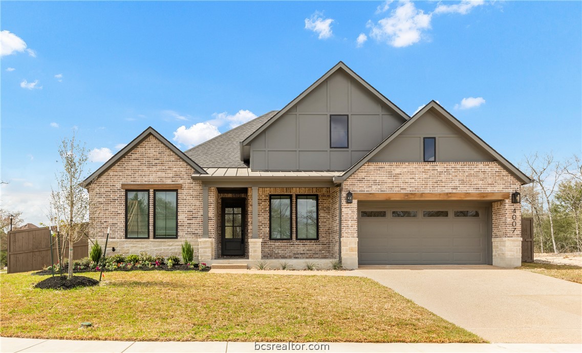 4007 Pacific Crest Way Bryan, TX 77802 - Photo 1 of 43 a front view of a house with a yard