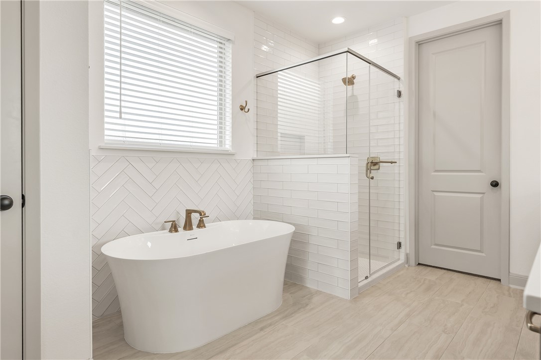 4007 Pacific Crest Way Bryan, TX 77802 - Photo 27 of 43 a bathroom with a white sink a shower and a mirror
