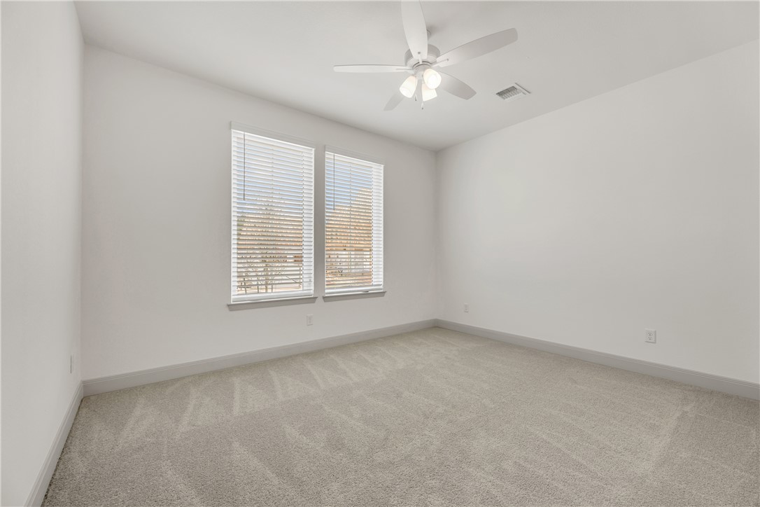 4007 Pacific Crest Way Bryan, TX 77802 - Photo 36 of 43 an empty room with a window
