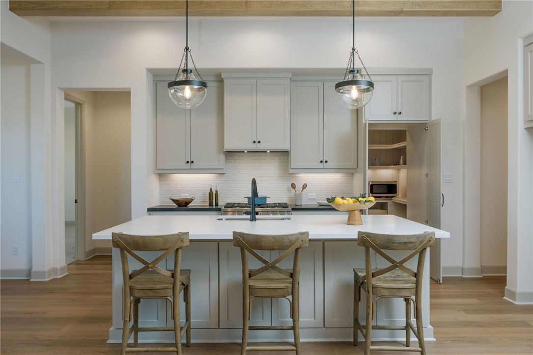 4007 Pacific Crest Way Bryan, TX 77802 - Photo 8 of 28 a view of a dining room with furniture and wooden floor