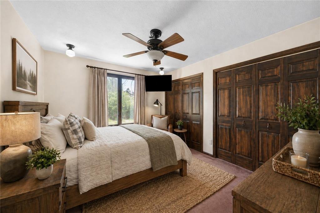 255 Claytonia Road Butler, PA 16001 - Photo 25 of 50 VIRTUALLY STAGED-13x10 main-level primary bedroom with two double closets and adjacent full bath—virtually staged to showcase design possibilities.