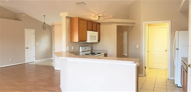 a room with a sink and a mirror