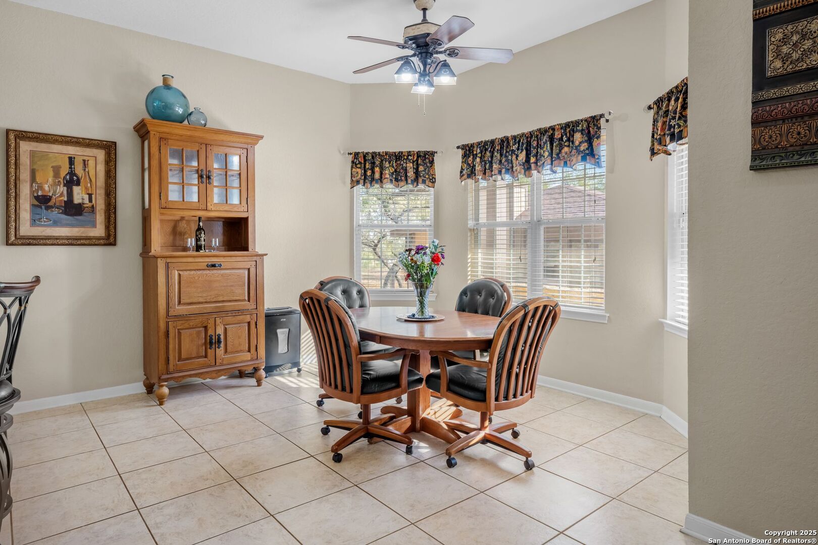 765 Highway 1604 Loop St. Hedwig, TX 78101 - Photo 11 of 50 a dining room with furniture and window