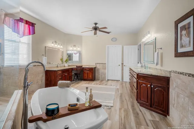 a view of a kitchen with washing machine and windows