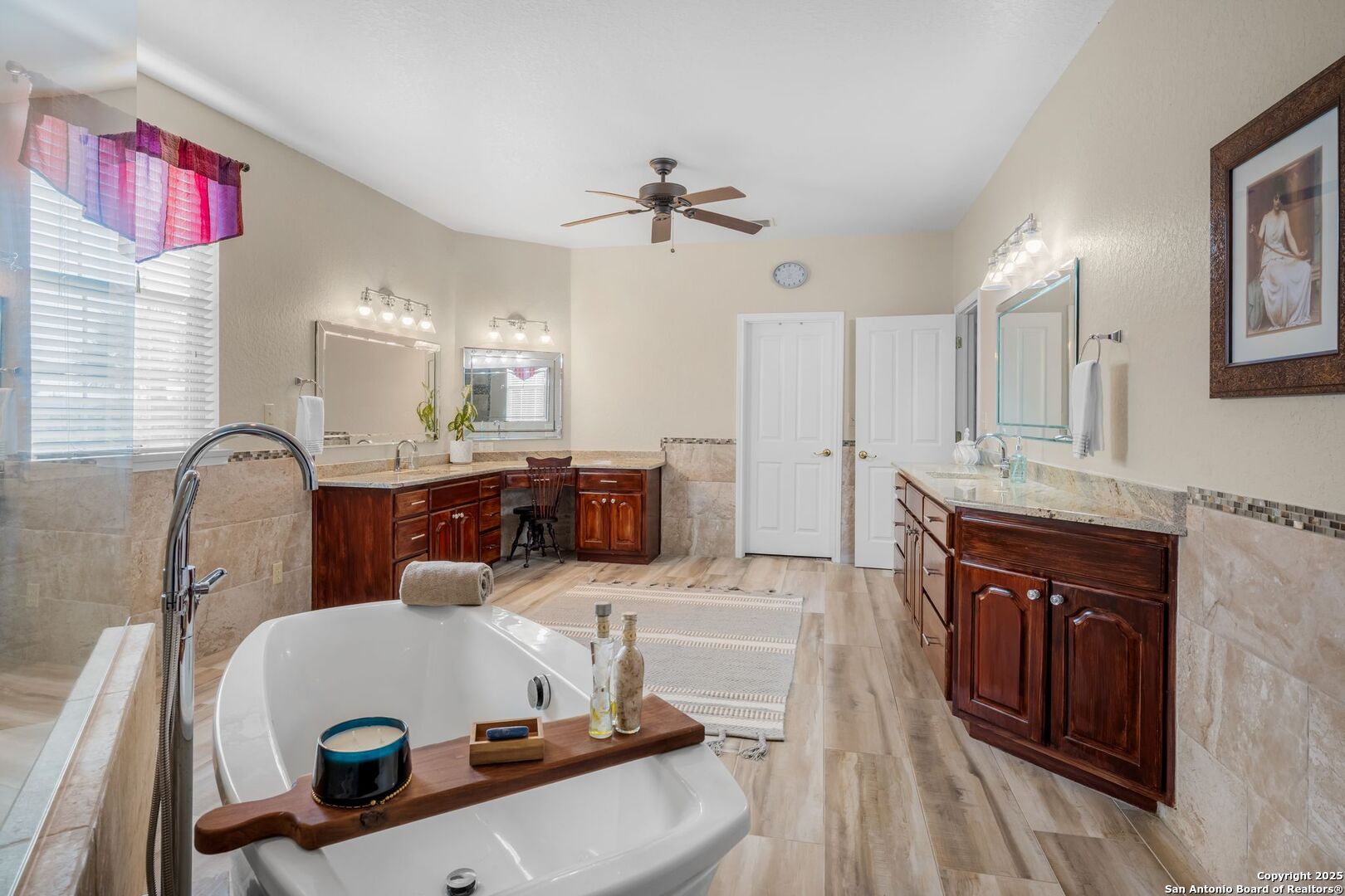 765 Highway 1604 Loop St. Hedwig, TX 78101 - Photo 18 of 50 a living room with kitchen island granite countertop furniture and a fireplace