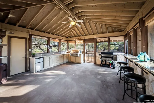a house view with a sitting space and garden space