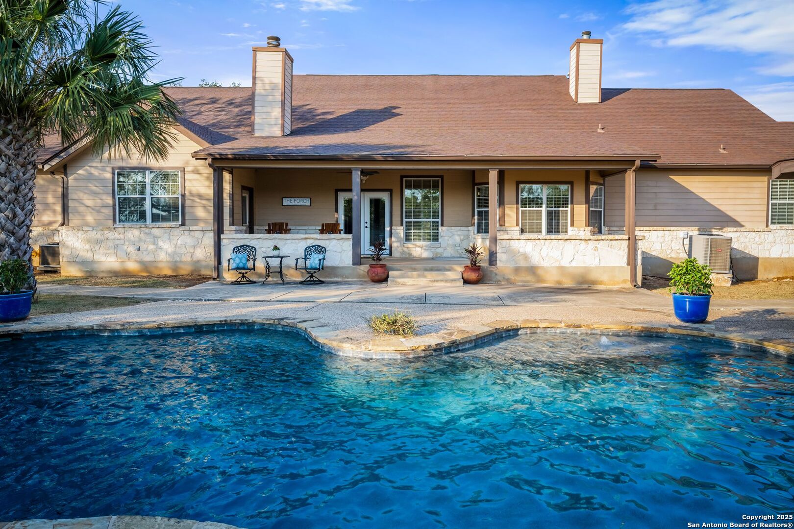 765 Highway 1604 Loop St. Hedwig, TX 78101 - Photo 36 of 50 a house view with a sitting space and garden space