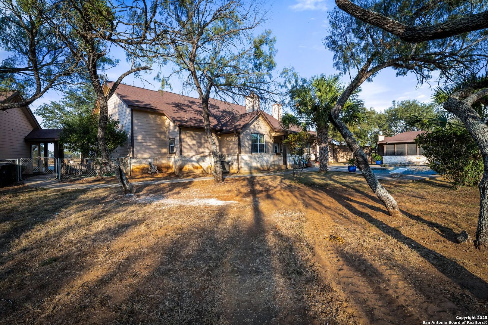 765 Highway 1604 Loop St. Hedwig, TX 78101 - Photo 39 of 50 a view of a swimming pool with sitting area