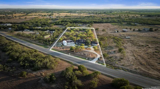 view of a house with a yard