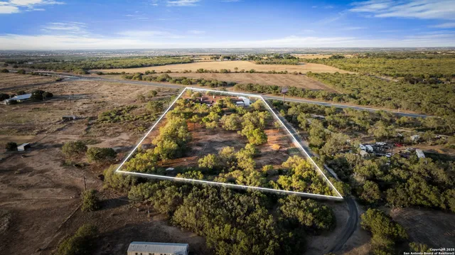 a view of a swimming pool and city view