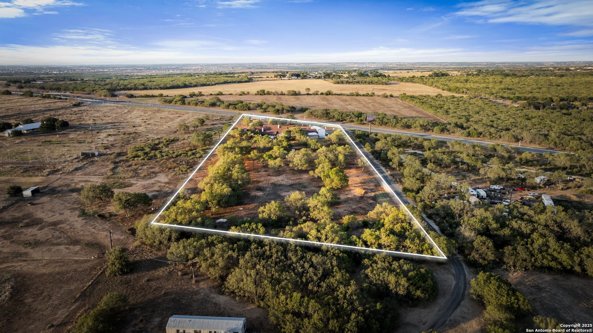 765 Highway 1604 Loop St. Hedwig, TX 78101 - Photo 48 of 50 an aerial view of beach and city